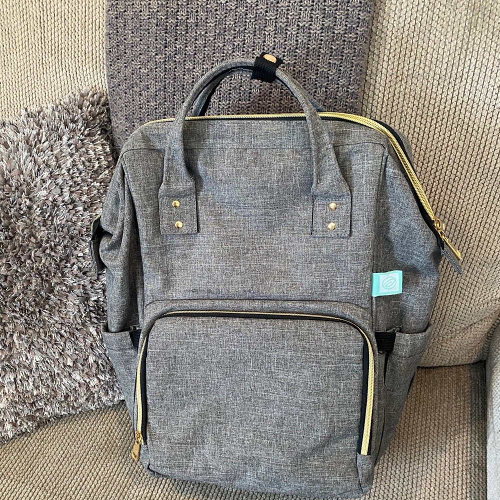 Diaper/ Pump Bag- solid gray with teal lining remaining.